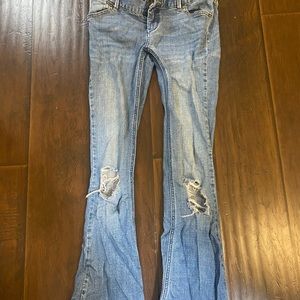 Free people bell bottom jeans with rips